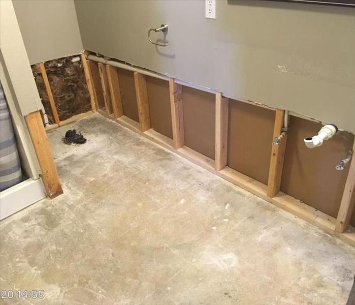 Surface of wall removed.