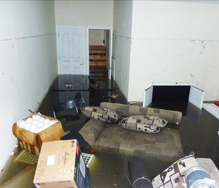Completely flooded basement. A visible line showing maximum water level higher than 7 feet.